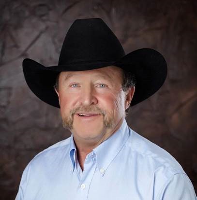 Snub Liles, co-founder of Macht-Liles Real Estate Group, in a black cowboy hat